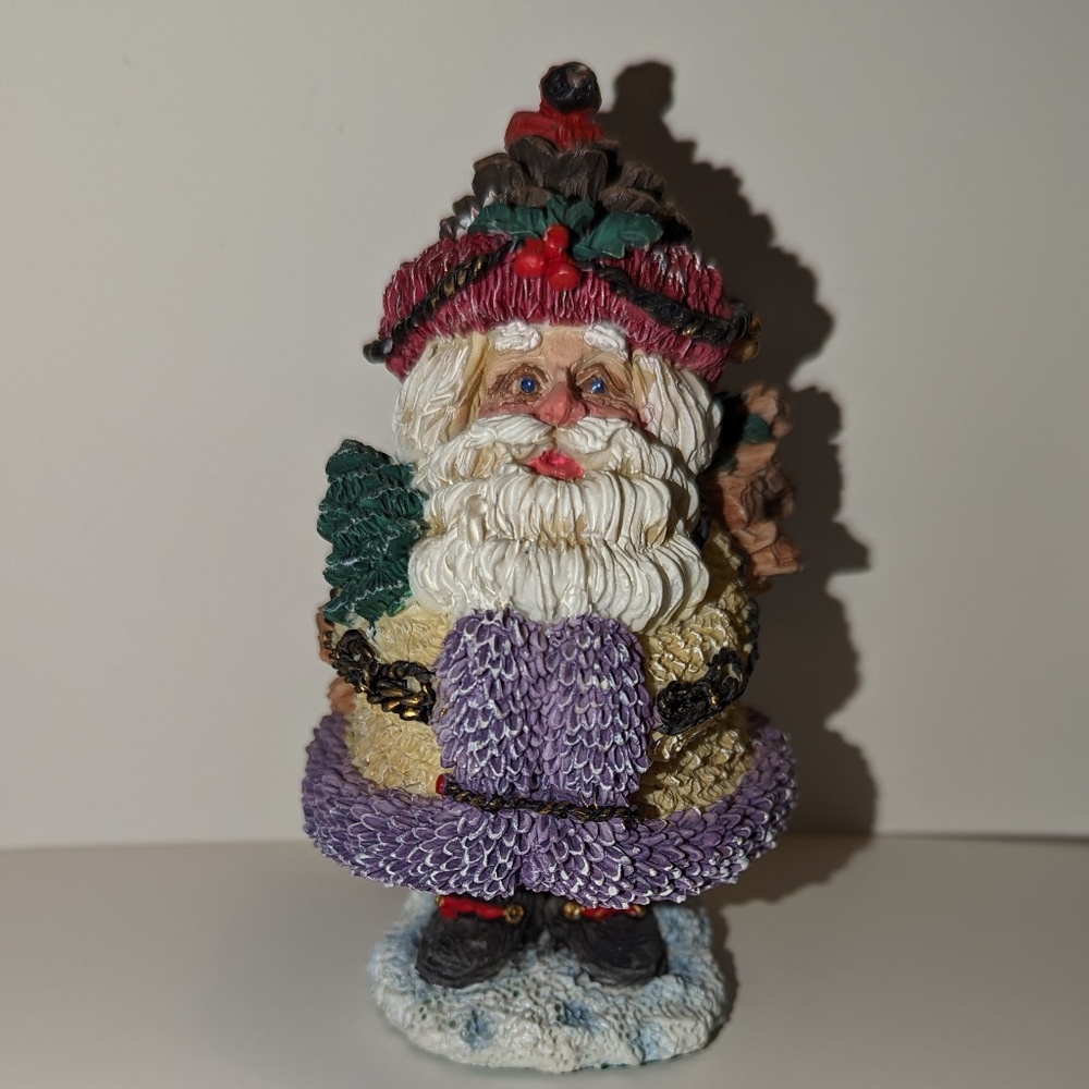Crinkle Clause By Possible Dreams Santa with Logs on back 1994